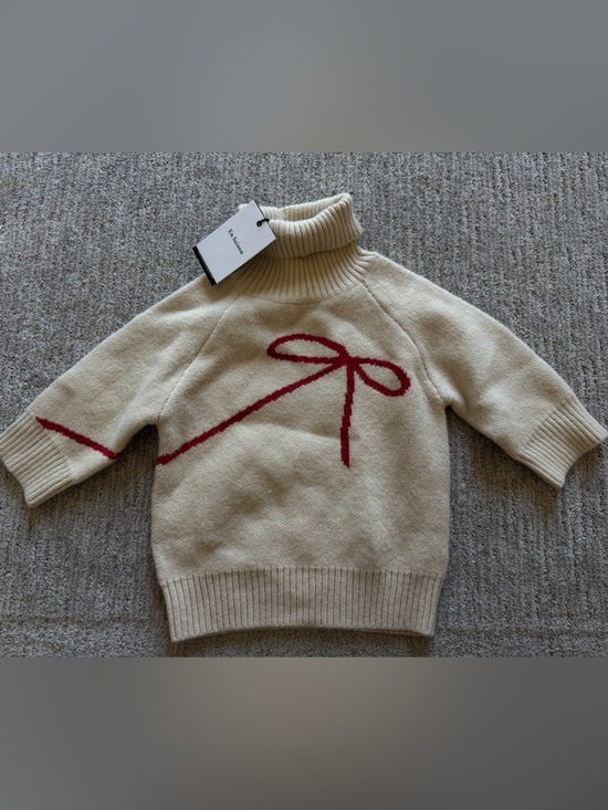 En Saison Sweaters - En Saison Cream Turtleneck Sweater with Red Bow Accent